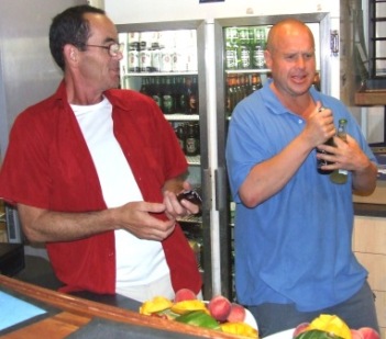 *Behind the bar: As always, Pat Taylor (left) and Peter Smith was quick to put their hands up to volunteer for a job for the night.